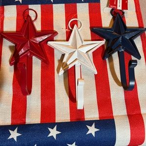 Set of 3 metal star wall hooks- red, white, and blue.